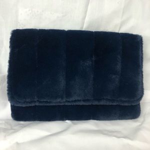 A New Day Faux Fur Wristlet Navy Blue. NWOT.